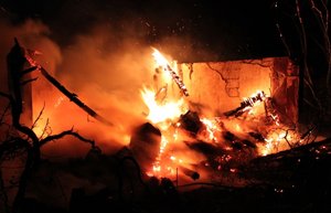 Gartenhaus in Flammen