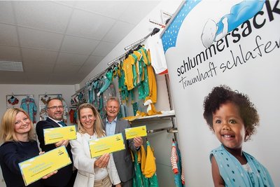 Nachwuchs ist ihnen willkommen: Sophie Gürtler, Geschäftsführerin des Stadtmarketing-Vereins, OB Steffen Zenner, Schlummersack-Produzentin Karina Grassy und Stadtmarketingchef Peter Kober (von links). 