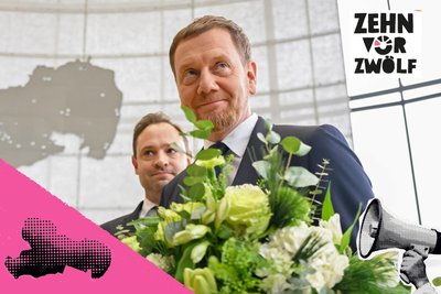 Michael Kretschmer (CDU) nach seiner Wiederwahl zusammen mit dem Präsidenten des Landtages Alexander Dierks.