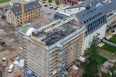 Reparaturarbeiten nach dem Dachstuhlbrand in der Alten Baumwolle Flöha: Investor Ticoncept rechnet mit einem Bauverzug von mindestens sechs Monaten.