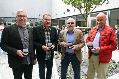 Frieder Weisflog, Joachim Junge, Klaus Baumann und Mirko Neubert (von links) haben die Zschopauer Ehrenmedaille erhalten.