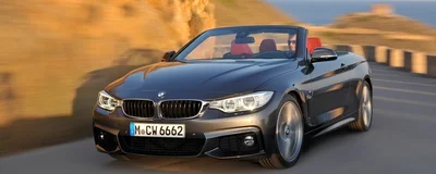 Sommerauto für Ganzjahresbetrieb: 4er Cabrio mit versenktem Blechdach.
