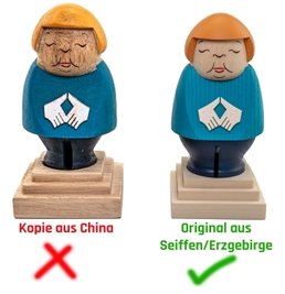 Die beiden Merkel-Figuren im Vergleich. 