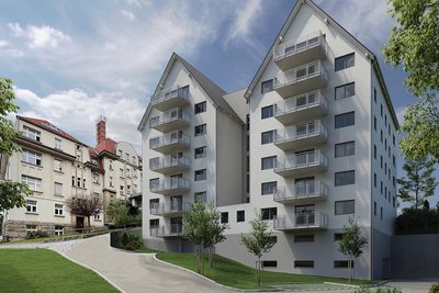 So soll sich das neue Gebäude in das Ensemble zwischen dem Landesamt für Straßenbau und Verkehr (links) und der IHK an der Weststraße einfügen. Zurzeit stehen auf dem Baugrundstück noch Bäume. Das Foto zeigt den Blick aufs Gebäude vom Aktienweg aus in Richtung Weststraße.