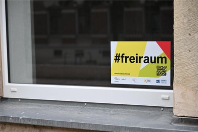 Werbung der Kreativachse.