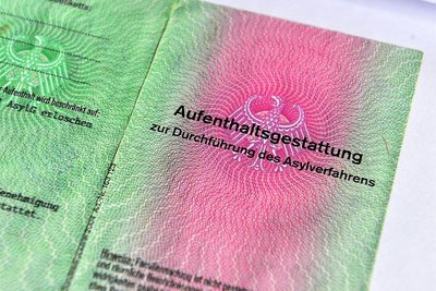Ein Dokument zur Aufenthaltsgestattung im Asylverfahren.