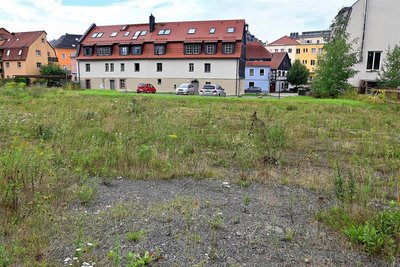 Die Brachfläche hinter der Brauhofstraße erhält Ökopflaster und asphaltierte Zufahrten.