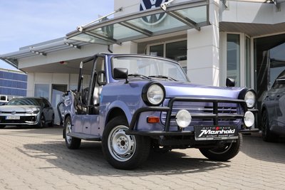 Der Trabant Caro Tramp wurde 1990 in Kleinserie gefertigt. Sein Markenzeichen sind die beiden Trittbretter und die „Bullenfänger“ an Front und Heck.