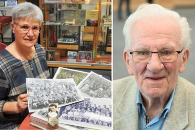 Petra Mogalle vom Hartmannsdorfer Heimatverein zeigt Fotografien aus der Schulgeschichte. Reinhold Irmscher war von 1948 bis 1990 an der Einrichtung tätig.