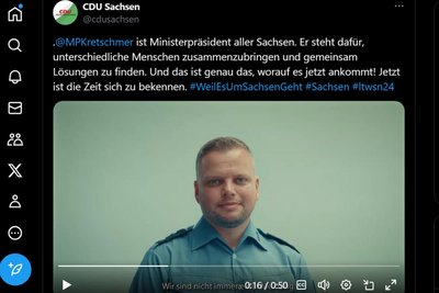 Michael Specht, wie er in Uniform für die CDU Sachsen und Michael Kretschmer wirbt.
