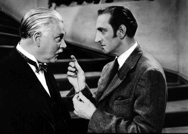 Old fashion: Der Brite Basil Rathbone als Meisterdetektiv (rechts), hier mit Nigel Bruce als Watson, war in mehreren Sherlock-Holmes-Filmen zwischen 1939 und 1946 zu sehen.