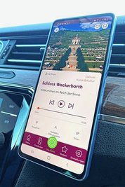Die Smartphone-App gibt Auskunft über nahe Reiseziele. 
