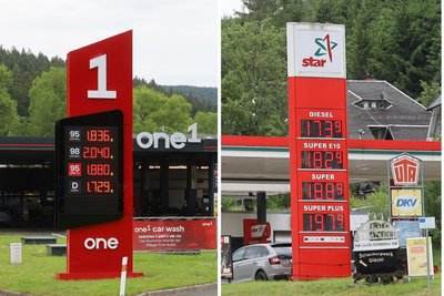 Blick auf die Preistafeln der Tankstellen in Potůčky (l.) und in Johanngeorgenstadt. Die Tankstelle in Potůčky ist damit im direkten Vergleich der Tankstellen hinter der Grenze am teuersten.