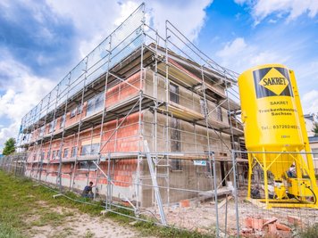 Der Rohbau, der schon 2021 fertig sein sollte, wurde im Mai abgeschlossen.