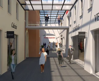 Zwischen dem historischen Gebäude und dem Neubau entsteht eine attraktive Passage. 