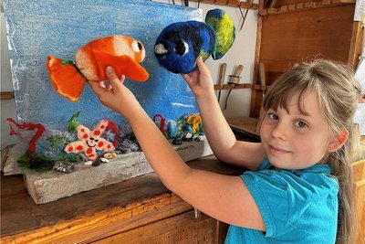 Nele gehörte mit ihren erst acht Jahren zu den jüngsten Teilnehmern des Symposiums. Doch die kleine Schwarzenbergerin überzeugte mit ihrem geflitzten 3-D-Bild eines Aquariums.