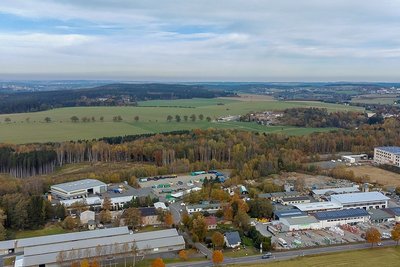 Im Bereich des heutigen Falkensteiner Gewerbeparks an der Plauenschen Straße befand sich bis in die 1920er-Jahre die Chemische Fabrik Dorfstadt, später ein Tanklager. Es gibt tiefe Kontaminationen. 