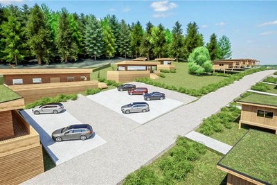 So könnte das Feriendorf am Gelenauer Kegelsberg einmal aussehen. Die 3-D-Grafik zeigt einen Parkplatz sowie mehrere der Ferienhäuser, von denen es laut Planer Tom Zeller 40 Stück geben soll. Grafik: Thomas Müller, Firma Teamgeist