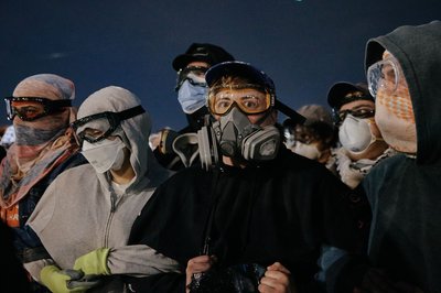Maskierte Demonstranten gegen die US-Einwanderungsbehörde ICE