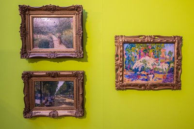 Grünes wie „Der Nutzgarten in Wannsee“ von Max Liebermann (oben) an einer grünen Wand.
