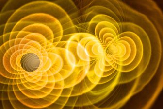 Einstein-Teleskop: Erschallen in der Lausitz bald Echos aus dem Universum? - Wissenschaftliche Simulation des Verschmelzens zweier Schwarzer Löcher. Die ringartigen gelben Strukturen zeigen an, wie Schwerkraftfelder dabei interagieren.