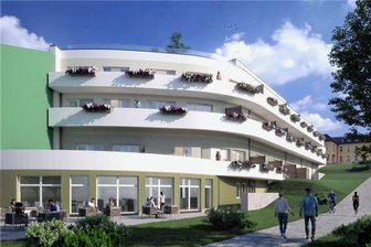 Firma investiert in Bad Schlema acht Millionen Euro in Neubau - Diese Visualisierung zeigt, wie das neue Wohn- und Geschäftshaus an der Kurpromenade in Bad Schlema einmal aussehen soll. Auf dem Dach ist das Installieren einer Fotovoltaikanlage geplant.