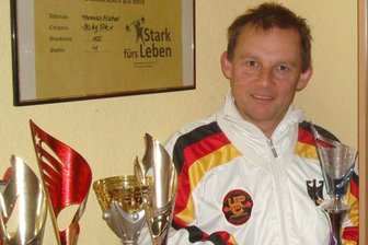Gärtner mit viermal WM-Silber - Thomas Fischer mit einigen seiner Trophäen.