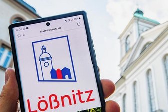 Kirchturm ohne Kreuz löst in Lößnitz Welle der Kritik aus - Das neue Logo der Stadt Lößnitz zeigt die Johanniskirche prominent - aber unvollständig.