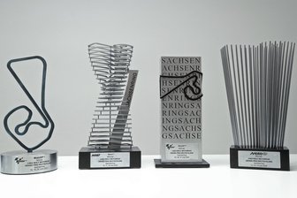 Kommentar zu neuer Moto-GP-Trophäe: Das Gesicht der Welt verändern - Pokale für den Moto-GP am Sachsenring.