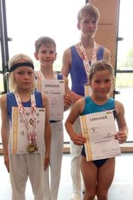 Kreis-Kinder-und Jugend-Spiele: Reicher Medaillenregen für den Flöhaer Turn-Nachwuchs - Robin Umlauft, Felix Trommler, Toni Umlauft und Luise Scheibler (v. l.) hatten Grund zu Freude.
