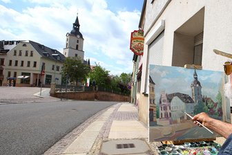 Marktfrau lädt zu Stadttour durch Meerane ein - 