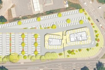 Millionenprojekt zugestimmt: Das plant Aue an der McDonalds-Kreuzung - Blick von oben auf das Bauareal unterhalb der Lößnitzer Straße: Mittig rechts sind die zwei geplanten Gebäude zu sehen, daneben und links davon die geplanten Parkplätze. 