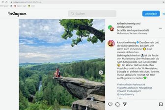 Olympiasiegerin Hennig an Wolkensteiner Felsklippe: Spektakuläre Werbung oder leichtsinnige Aktion? - Olympiasiegerin Katharina Hennig sitzt in der Wolkensteiner Schweiz an der Felskante. Das bei Instagram gepostete Bild wird kritisiert.