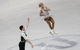 Paarlauf-Olympiasieger Savchenko/Massot in Führung bei WM Mailand - Aljona Savchenko und Bruno Massot legen bei der WM im Mailand ein klasse Kurzprogramm hin.