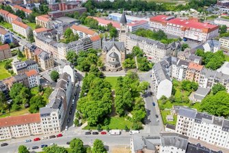 Plauener Sanierungsgebiet Haselbrunn steht: Eigentümer profitieren - Der Plauener Stadtteil Haselbrunn aus der Luft.