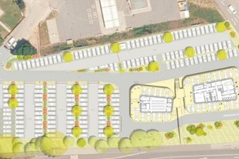 Räte stimmen für Millionenprojekt - Blick von oben auf das Bauareal unterhalb der Lößnitzer Straße: Mittig rechts sind die zwei geplanten Gebäude zu sehen, daneben und links davon die geplanten Parkplätze.