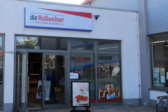 Roßweiner Knacker-Rückruf: Untersuchungen laufen derzeit noch - Eine Filiale der Fleischerei Die Roßweiner im Fachmarktzentrum am Bahnhof in Freiberg.