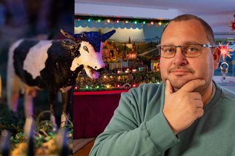 Singende Kühe in Crottendorf: Warum Sie diesen Weihnachtsberg im Erzgebirge unbedingt sehen müssen - Eine „singende“ Kuh und Tobias Günther, der Hüter des Crottendorfer Weihnachtsbergs.