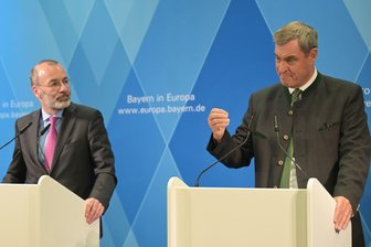 Söder fordert mehr Einsatz in Berlin gegen US-Militärpläne - Der mögliche Abzug von US-Soldaten aus Bayern überschattet die Brüssel-Reise des bayerischen Kabinetts.