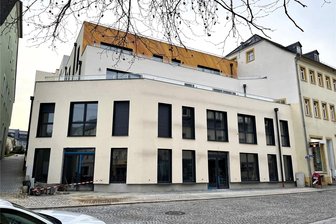 Tedi in Hainichen: Jetzt gibt es einen Eröffnungstermin - Hier zieht Tedi ein: So zeigt sich nun das Wohn- und Geschäftshaus der Marktterrassen in Hainichen.