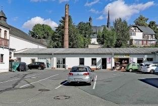 Umfrage zum Dorfzentrum steht auf der Tagesordnung - Der Flachbau soll um eine Etage aufgestockt werden. 