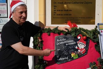 Vorsicht Satire: Burgstädter feiern bei fast 30 Grad Weihnachten und haben dabei Größeres im Visier - Hier geht es lang zum Weihnachtsmarkt in Burgstädt. Der „wohl früheste in Sachsen“, vermutet Organisator Jürgen Hoffmann.
