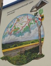Vorwurf: Zubrot per Zusatzklausel - 
              <p class="artikelinhalt">Idylle auf dem Wandbild am Heizhaus der Wohnungsbaugesellschaft Zwönitztal in Thalheim. Aber das ist nur Fassade. Andreas Tannert/Archiv</p>
            