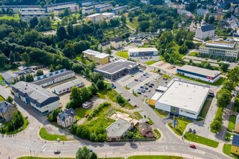 Wie das Einkaufszentrum in Marienberg wachsen soll - Blick aus der Vogelperspektive auf das Einkaufsgebiet an der Hanischallee. 